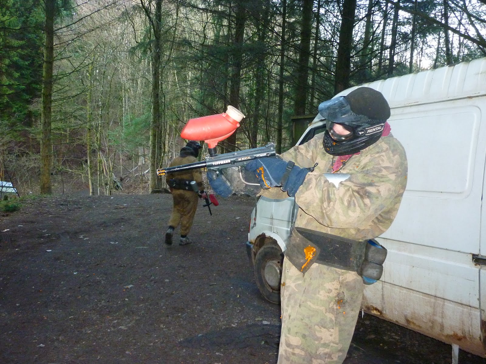 With Paintballing Gun